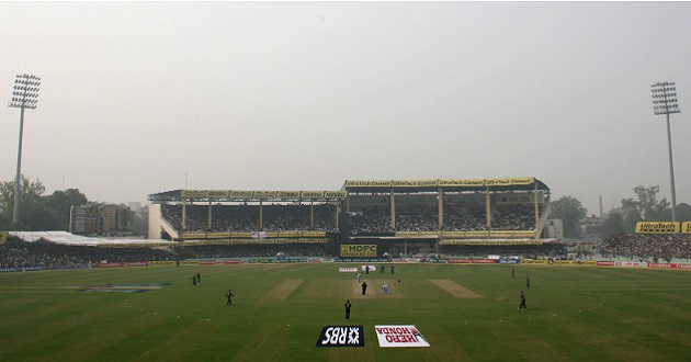 indian woman cricketer in stadium