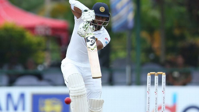 karunaratne plays one straight down the ground