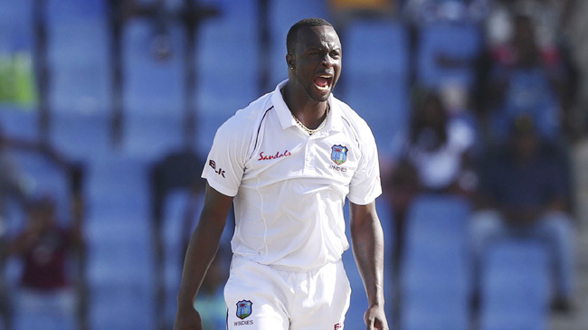 kemar roach celebrates a wicket