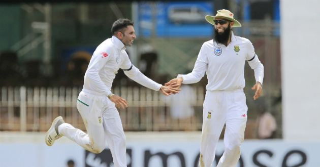 keshav maharaj and hashim amla celebrate