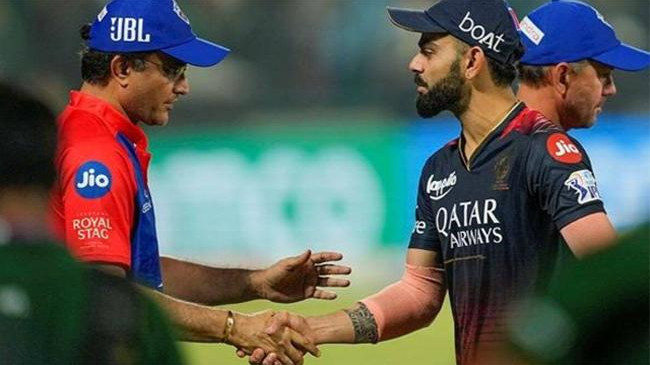 kohli shakes hands with sourav