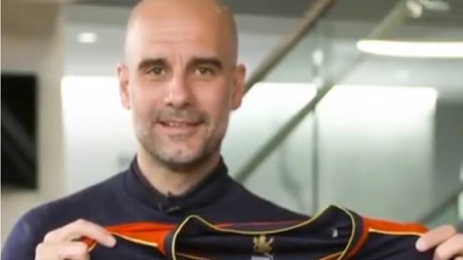 mancity boss guardiola with virat kohli jersey