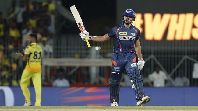 marcus stoinis celebrates his century