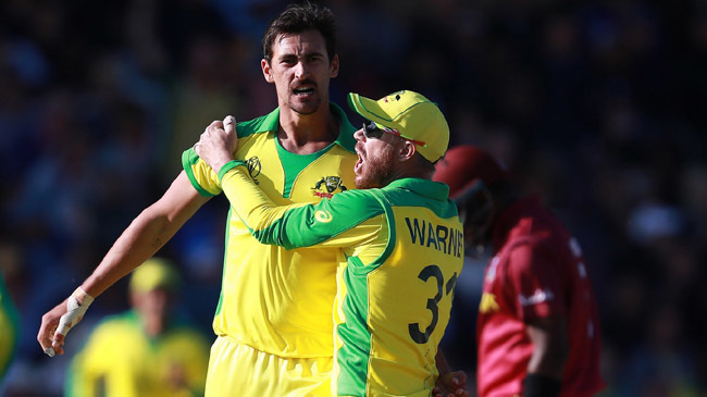 mitchell starc celebrates wicket