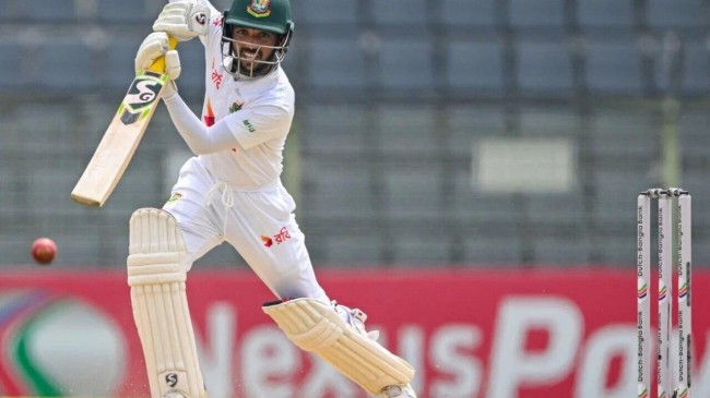 mominul haque plays a drive 