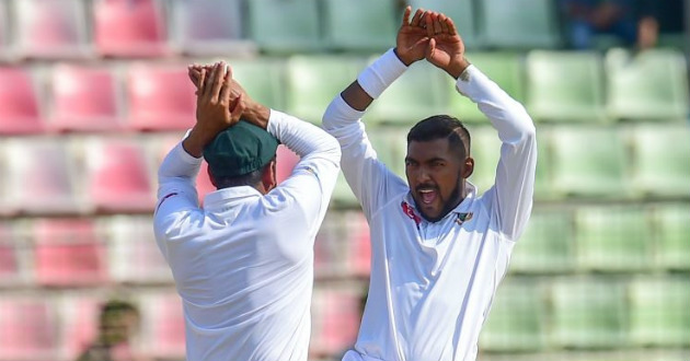 nazmul islam celebrating his first test wicket