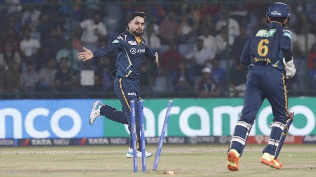 rashid celebrates after bowling abishek porel