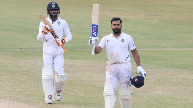 rohit sharma completing a century