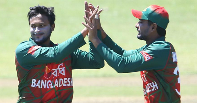 shakib al hasan and mahmudullah celebrating a wicket