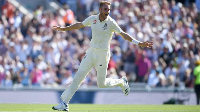 stuart broad wheels away in celebration after dismissing david warner