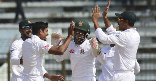 taijul islam celebrating a wicket with mushifq and soumya