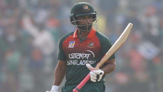 tamim acknowledges the crowd after his century