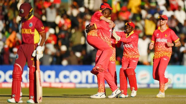 the zimbabwe players celebrate