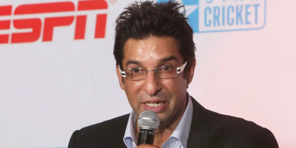 wasim akram stands with taskin