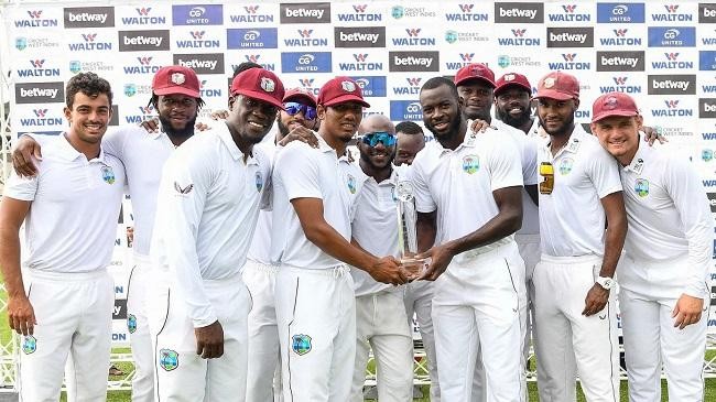 west indies cricket team celebration with trophy