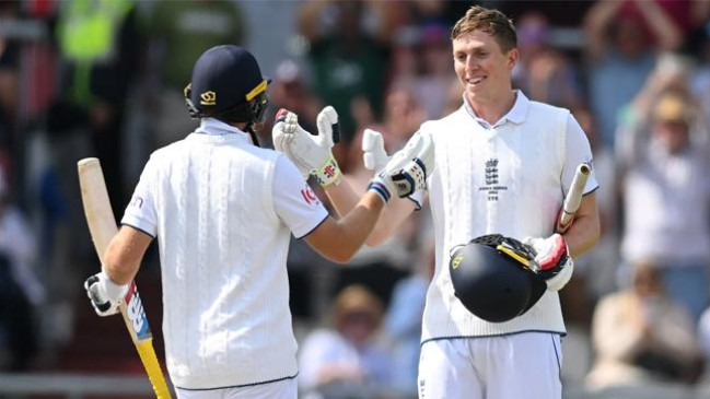 zak crawley gets handshake from joe root