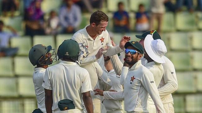 zimbabwe fielders celebrate a wicket