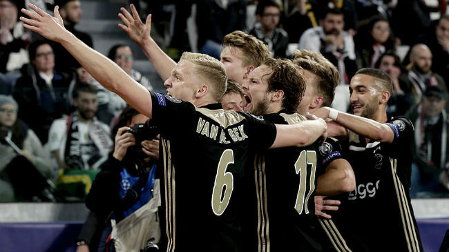 ajax celebrate their historical victory