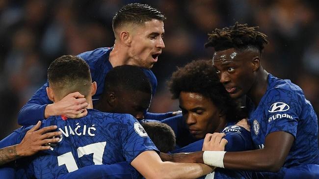 chelsea celebrating a goal over lille