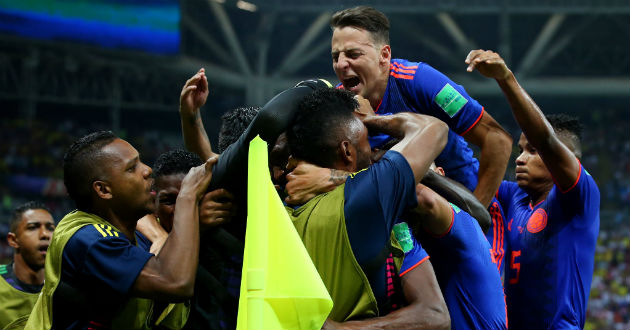 colombia celebrating comfortable victory over poland