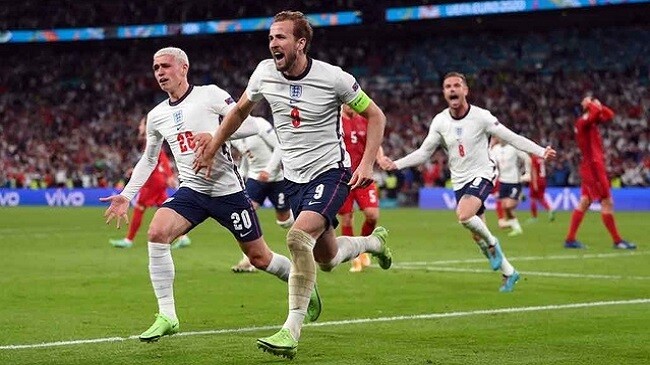 england celebrating a goal over denmark