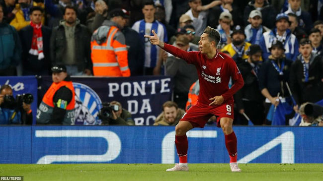 firmino celebrates a goal for liverpool