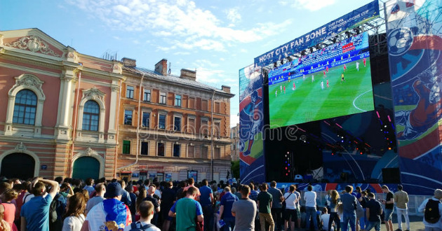 large screen football match