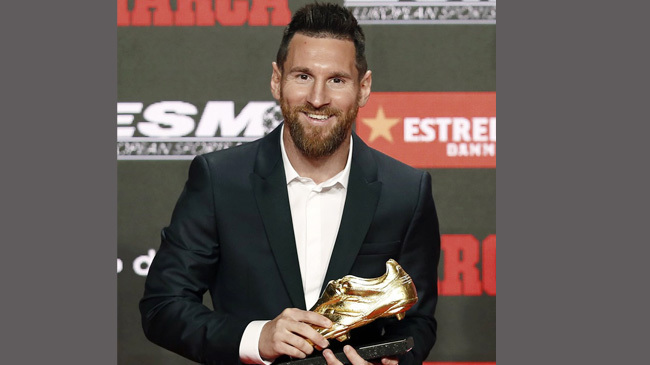 messi receives the golden shoe award