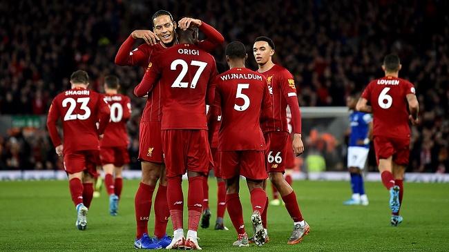 liverpool celebrate a goal over everton