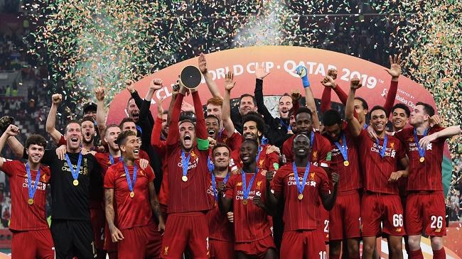 liverpool celebrating club world cup trophy