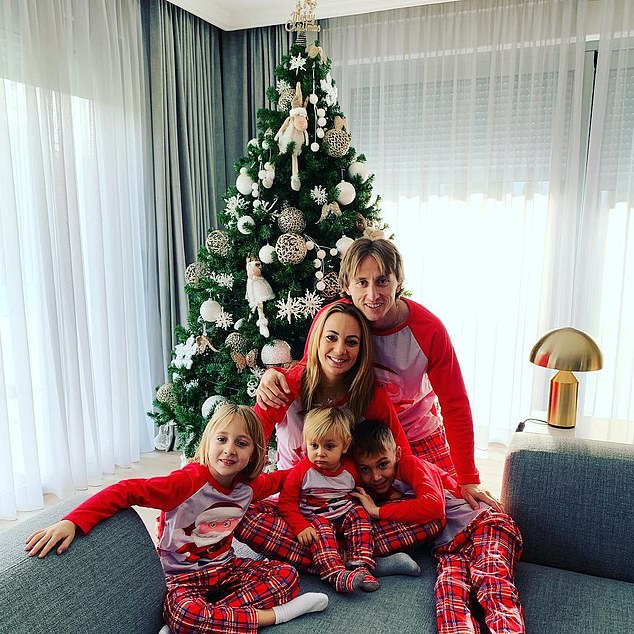 luka modric celebrating with family