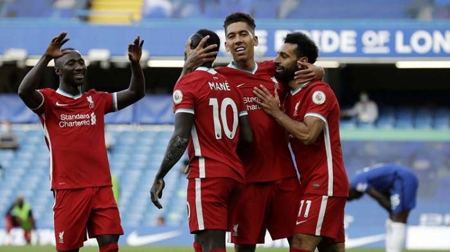 mane celebrates a goal for liverpool