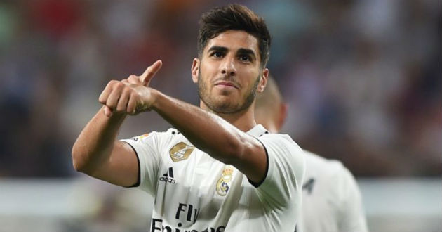 marco asensio celebrates a goal