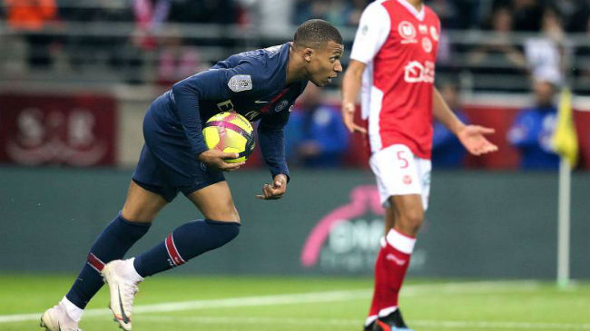 mbappe celebrates a goal