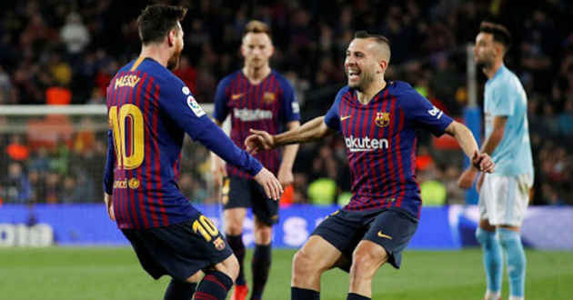 messi celebrates a goal with alba