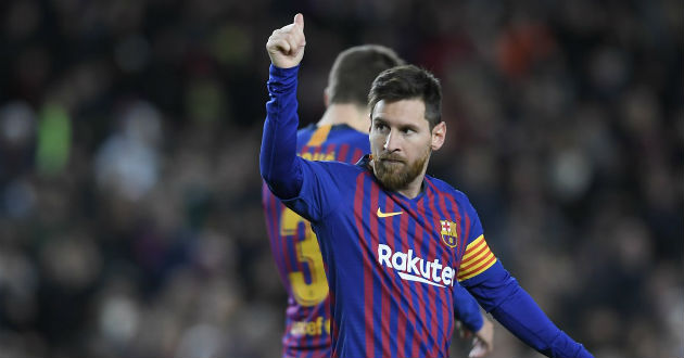 messi celebrates his landmark goal for barcelona