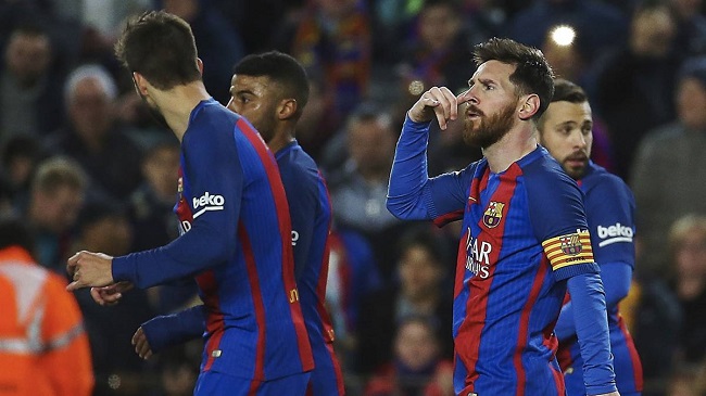 messi goal celebration with teammates