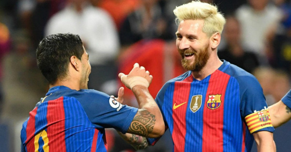 messi is a giant says suarez