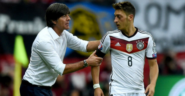 mesut ozil with joachim loew