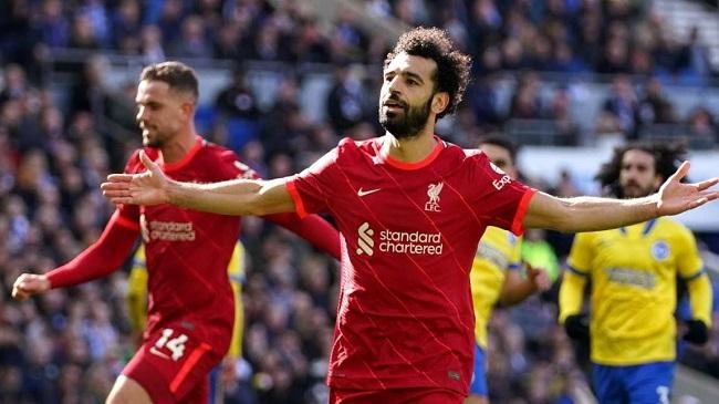 mohamed salah celebrates scoring for liverpool