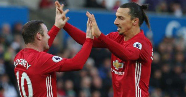 rooney and ibrahimovic celebrating a goal for manu
