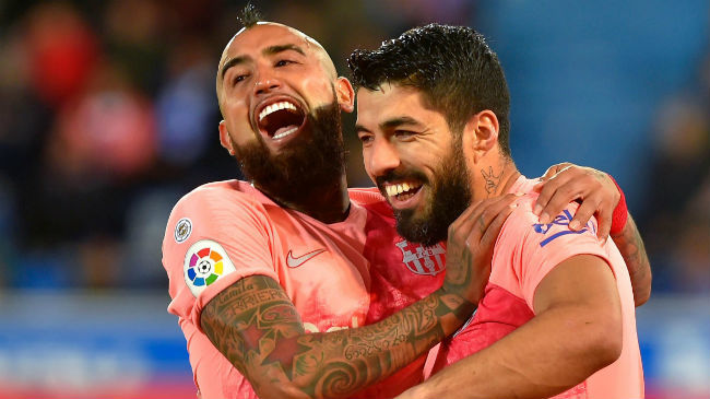 suarez and vidal celebrating a goal