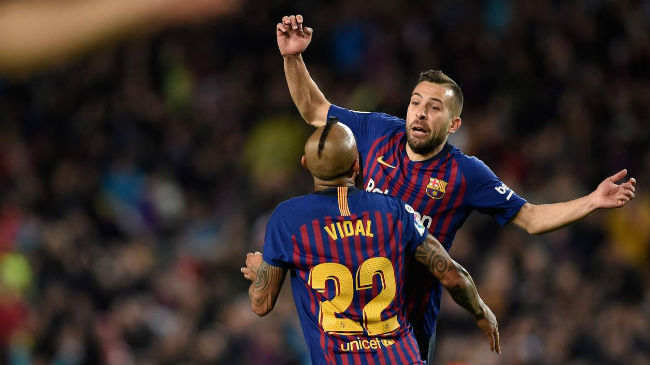 vidal and alba celebrate a goal for barcelona