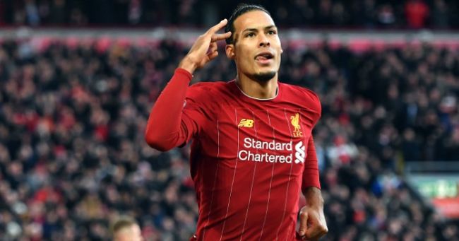 virgil van dijk celebrates a goal