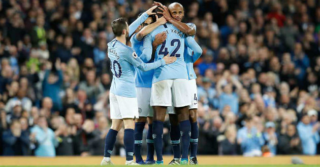 yaya toure was embraced by his colleagues after the final whistle