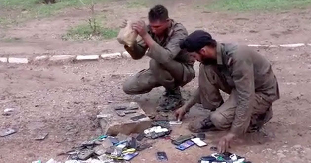 Indian Army smashes mobile phones