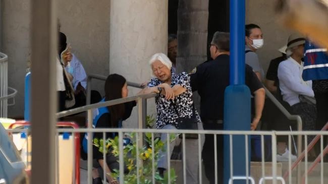 a counselor attends to a grieving woman