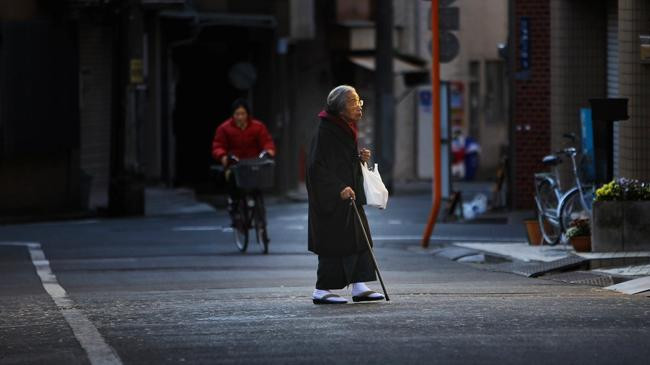 a old man in tokyo road
