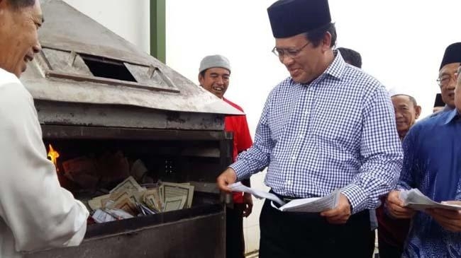 al quran disposal site