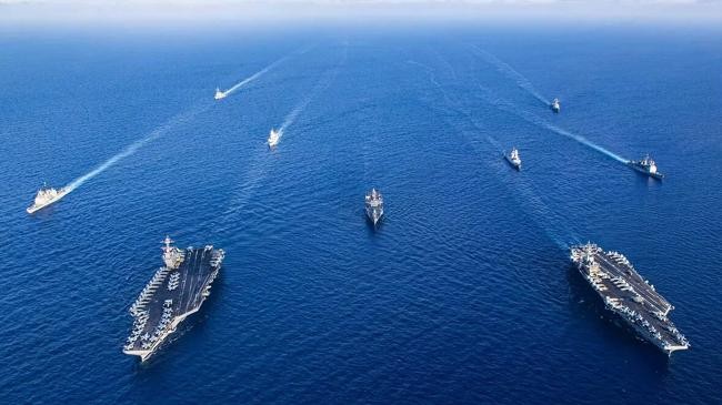 an aerial view of aircraft carriers of the united states navy